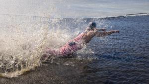 Diver in a red striped suit.